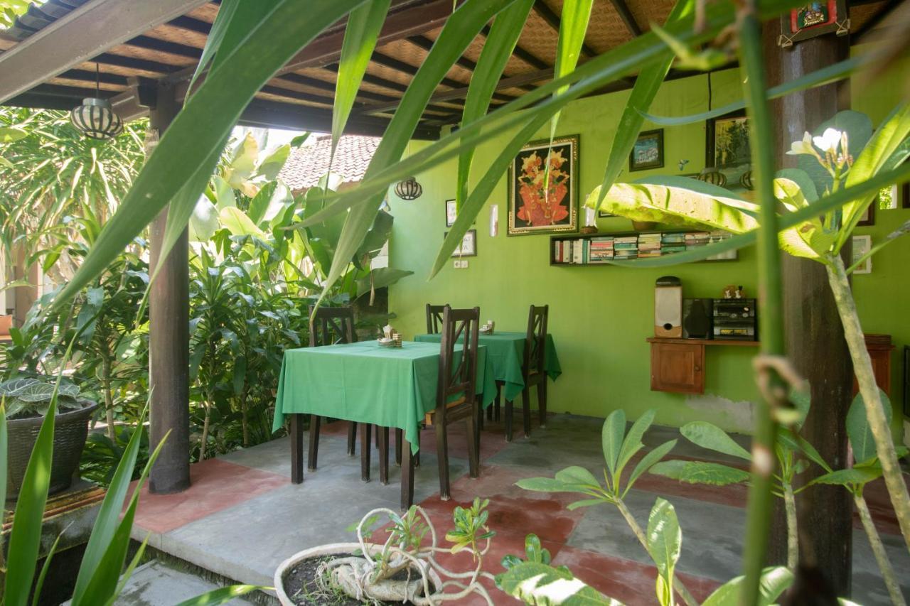 Giri Sari Guest House เปมูเตรัน ภายนอก รูปภาพ
