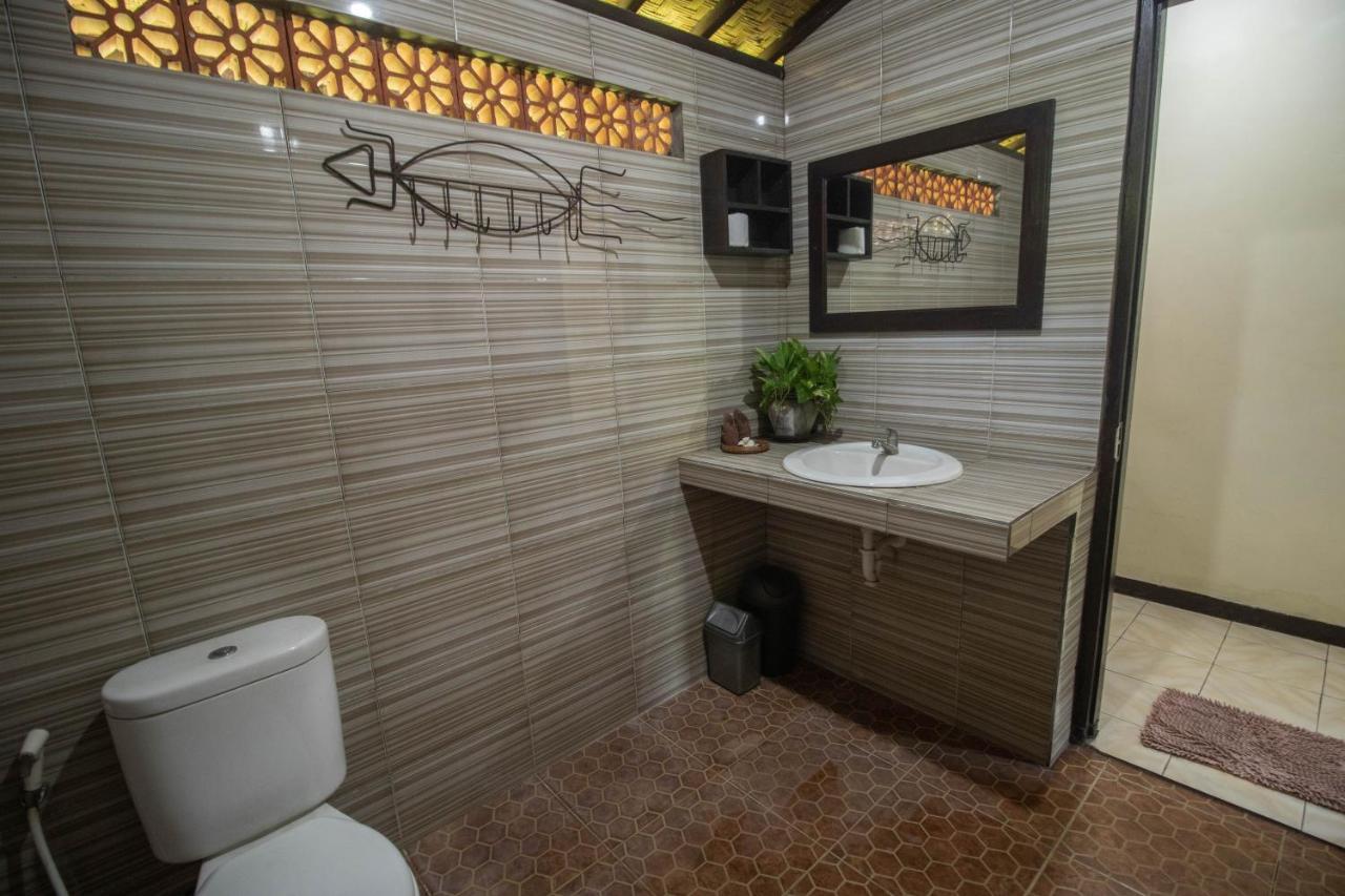 Giri Sari Guest House เปมูเตรัน ภายนอก รูปภาพ