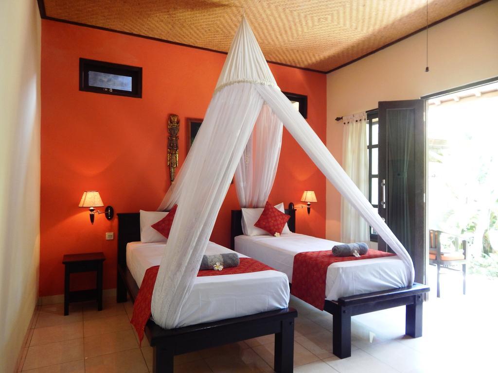 Giri Sari Guest House เปมูเตรัน ภายนอก รูปภาพ