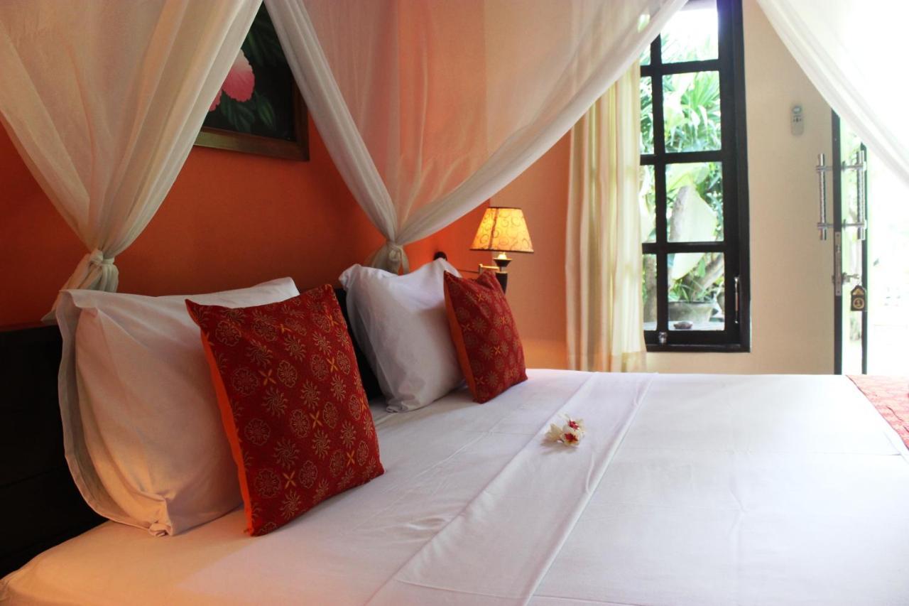 Giri Sari Guest House เปมูเตรัน ภายนอก รูปภาพ